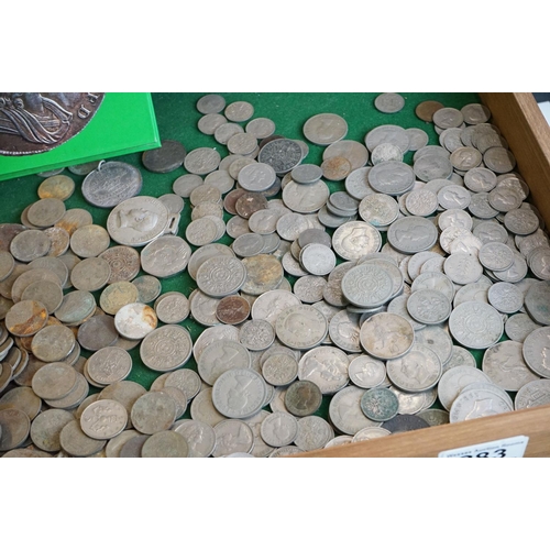 283 - A large collection of mixed coins and banknotes to include British pre decimal and foreign examples.