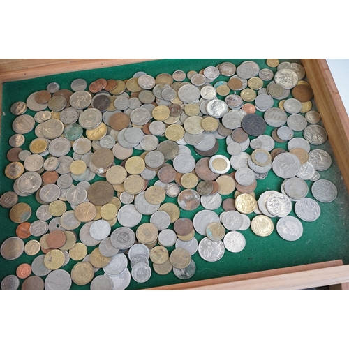 283 - A large collection of mixed coins and banknotes to include British pre decimal and foreign examples.