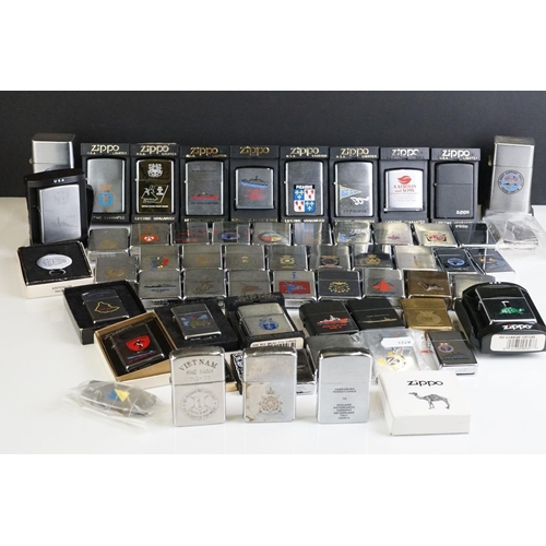 289 - A large collection of approx sixty Zippo lighters to include military and advertising examples, toge... 