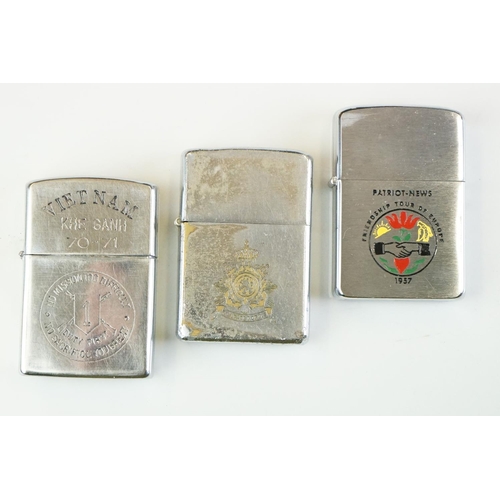 289 - A large collection of approx sixty Zippo lighters to include military and advertising examples, toge... 