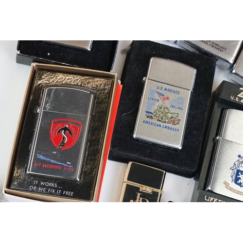 289 - A large collection of approx sixty Zippo lighters to include military and advertising examples, toge... 