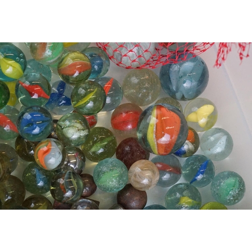 299 - A small collection of mixed marbles.