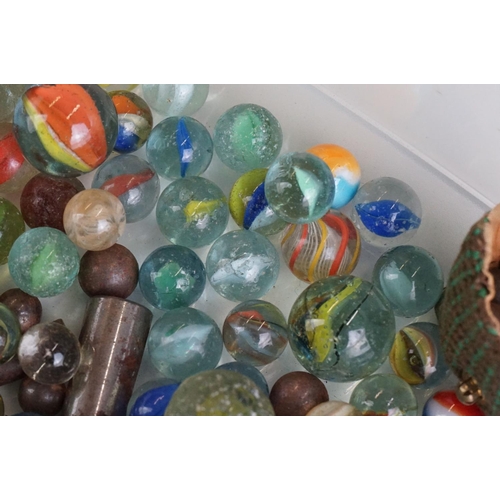 299 - A small collection of mixed marbles.