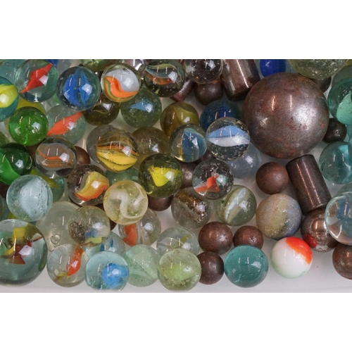 299 - A small collection of mixed marbles.