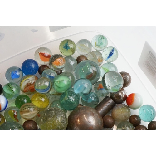 299 - A small collection of mixed marbles.