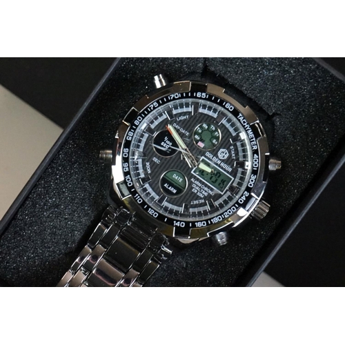 311 - A collection of gents and ladies fashion watches all within original boxes to include Casio and Gues... 