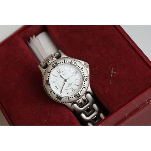 311 - A collection of gents and ladies fashion watches all within original boxes to include Casio and Gues... 