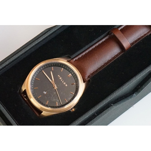 311 - A collection of gents and ladies fashion watches all within original boxes to include Casio and Gues... 