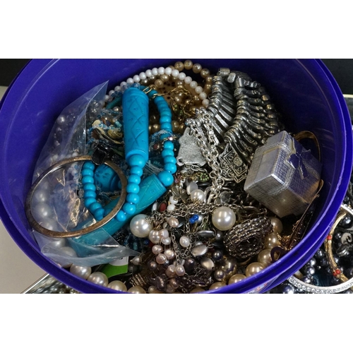 312 - Three tins / tubs of costume jewellery, to include necklaces, bangles, earrings etc