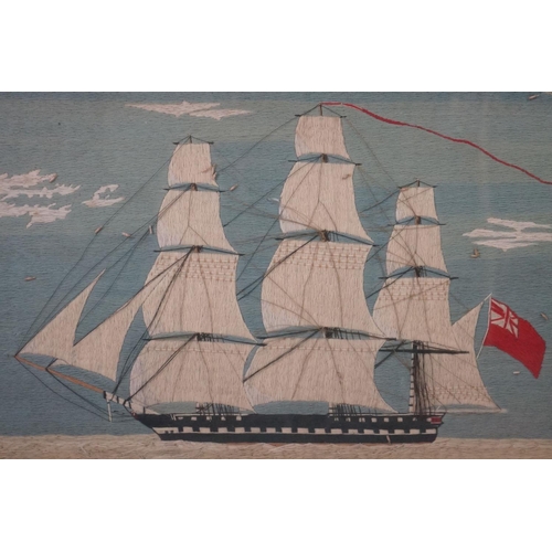 514 - 19th century Woolwork Embroidery of a Three Mast Sailing Ship at Sea, 47cm x 76cm, framed and glazed