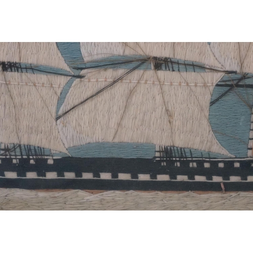 514 - 19th century Woolwork Embroidery of a Three Mast Sailing Ship at Sea, 47cm x 76cm, framed and glazed