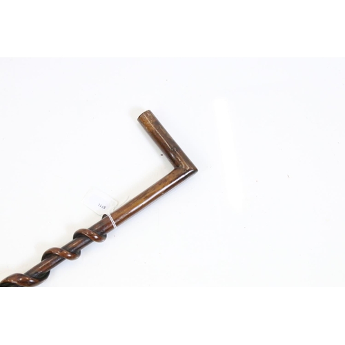 158 - Hardwood Walking Stick, the shaft carved with an entwined snake, 84cm long
