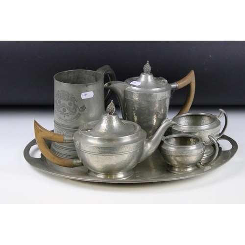 328 - A early 20th century Tea Service comprising of teapot, water jug, cream jug, sugar bowl and serving ... 