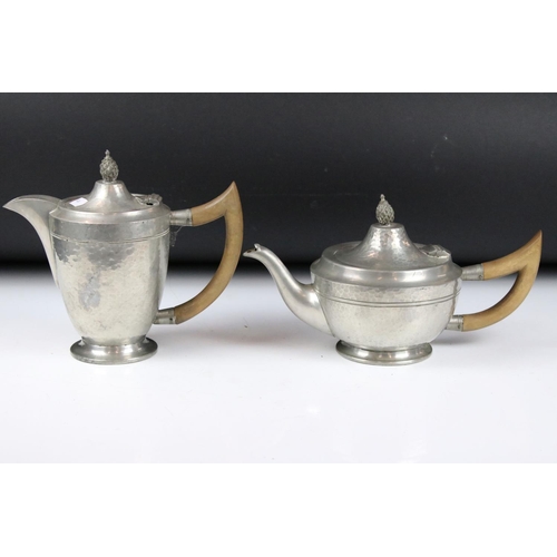 328 - A early 20th century Tea Service comprising of teapot, water jug, cream jug, sugar bowl and serving ... 