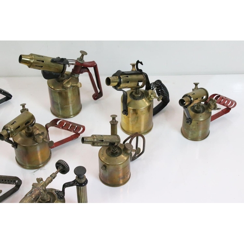 349 - A collection of vintage brass blow torches to include Burmos and Primus examples.