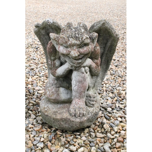 535 - Pair of Garden reconstituted stone gargoyles, 43cm high