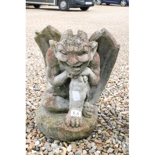 535 - Pair of Garden reconstituted stone gargoyles, 43cm high