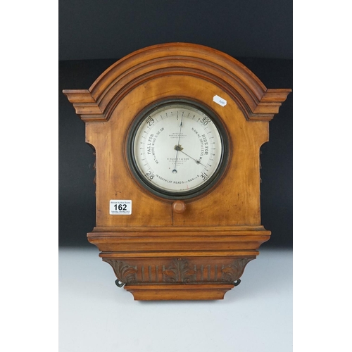 162 - Late 19th / Early 20th century  Domed Walnut Cased Wall Hanging Barometer by H Hughes of London with... 