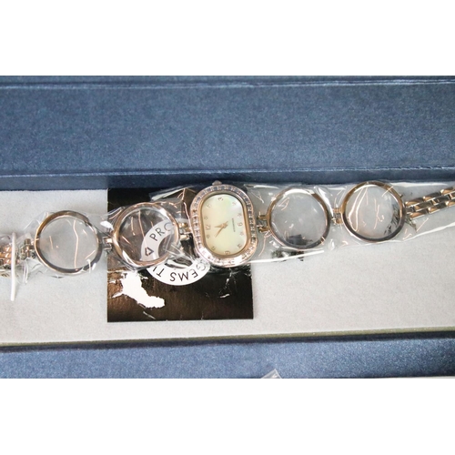 210 - A small collection of contemporary costume jewellery and watches.