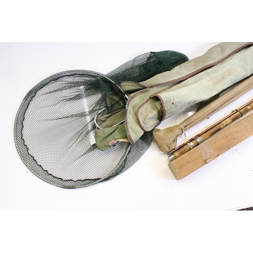 402 - A collection of vintage fishing tackle to include split cane fishing rod.