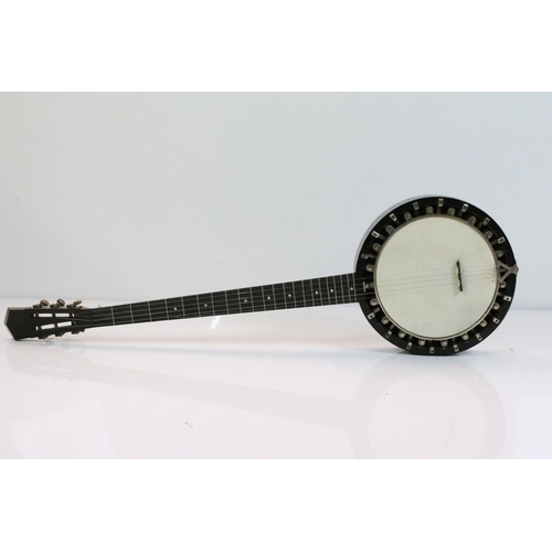 403 - A vintage five string banjo in original fitted case.