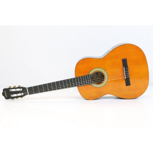 404 - A Clifton six string acoustic guitar together with gig bag.