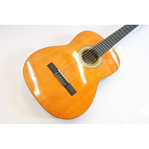 404 - A Clifton six string acoustic guitar together with gig bag.