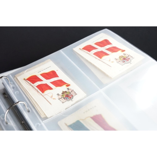 413 - Cigarette cards - Collection of several hundred silks and blankets in ten modern binders, flags, act... 