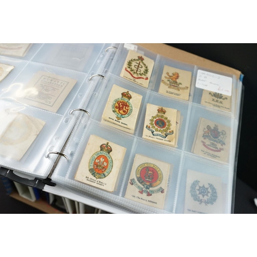 414 - Cigarette cards - Collection of several hundred silks in nine modern binders, military, art, history... 