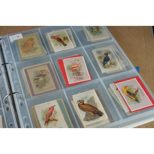 416 - Cigarette cards - Collection of several hundred silks in eight modern binders, nature, sport, milita... 