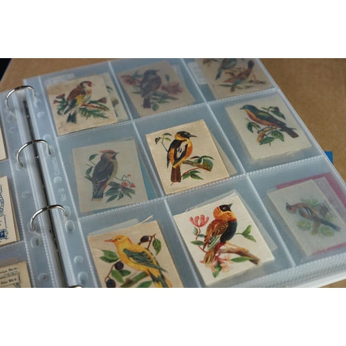 416 - Cigarette cards - Collection of several hundred silks in eight modern binders, nature, sport, milita... 