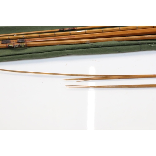 400 - A collection of four vintage fishing rods to include a Hardy example.