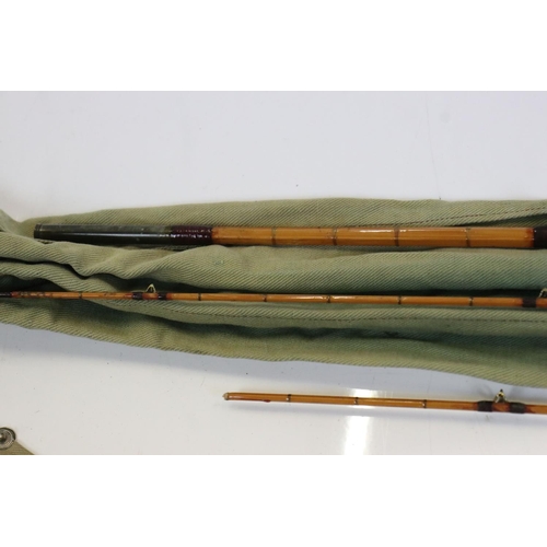 400 - A collection of four vintage fishing rods to include a Hardy example.