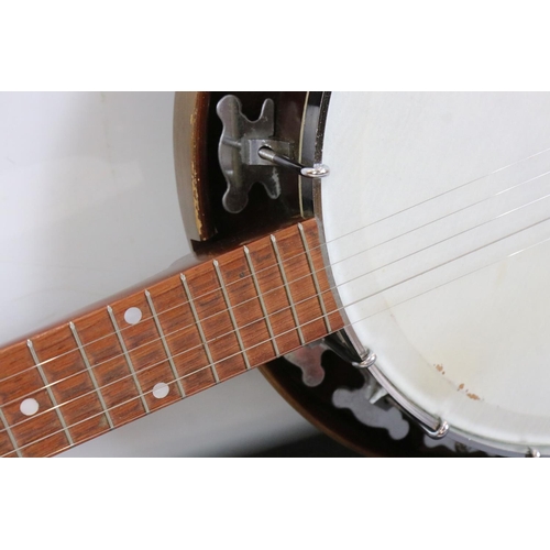 405 - A vintage Dallas five string banjo in original fitted case.