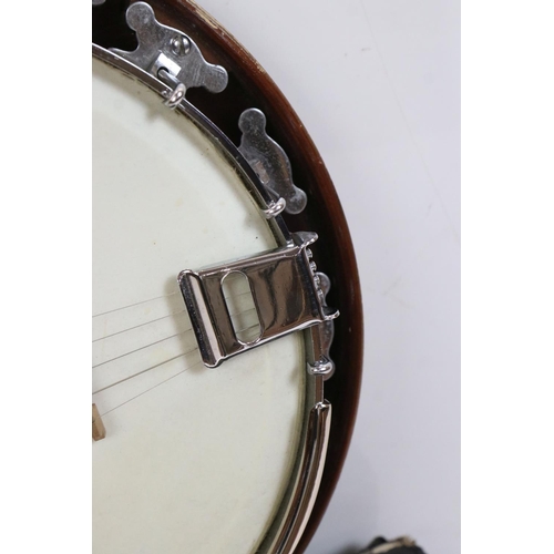 405 - A vintage Dallas five string banjo in original fitted case.