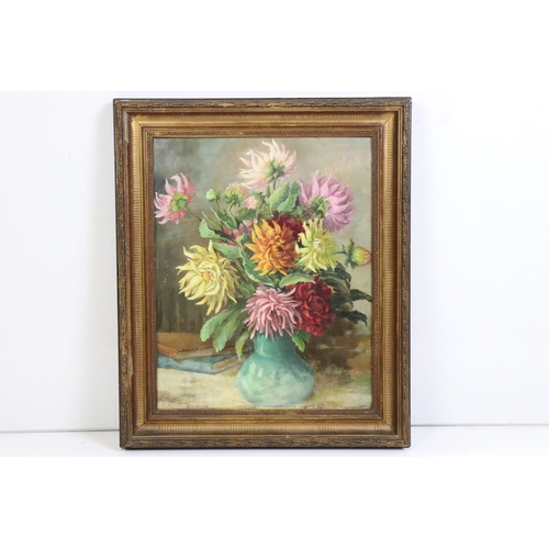 448 - N M Lay, a gilt framed oil on board, still life of dahlias in a ceramic vase, 50cm x 40cm