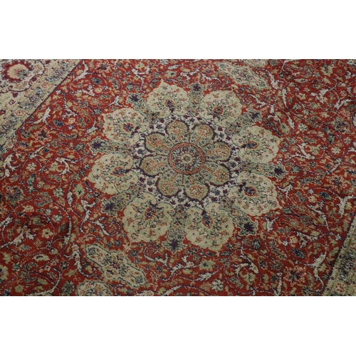 576 - Red Ground Rug with Perisan style design, approximately 236cm x 168cm