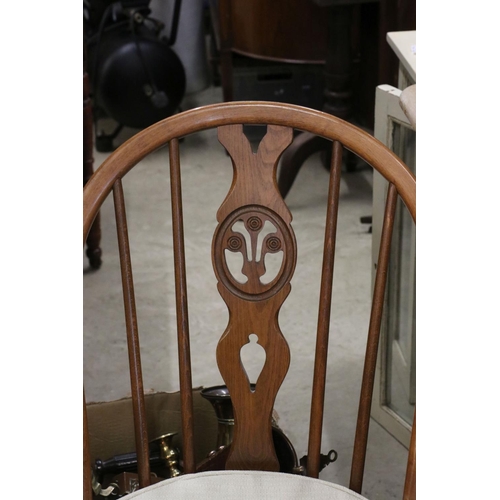 607 - Set of Six Ercol Elm and Beach Dining Chairs with Fleur de Lys Hoop Backs and seat pads together wit... 