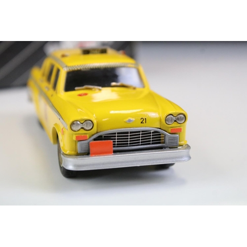 1036 - Four boxed 1/43 Western Models metal models to include WP109 Aston Martin, WMS 55 1974 Checker Cab (... 