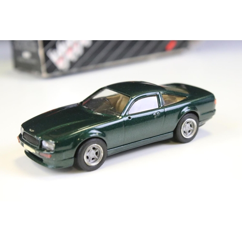 1036 - Four boxed 1/43 Western Models metal models to include WP109 Aston Martin, WMS 55 1974 Checker Cab (... 