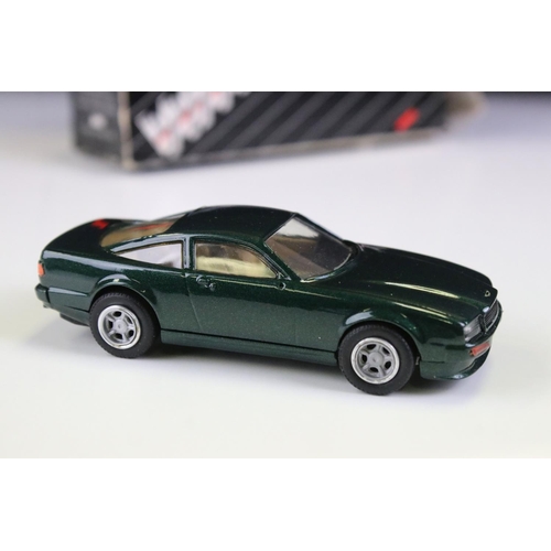 1036 - Four boxed 1/43 Western Models metal models to include WP109 Aston Martin, WMS 55 1974 Checker Cab (... 