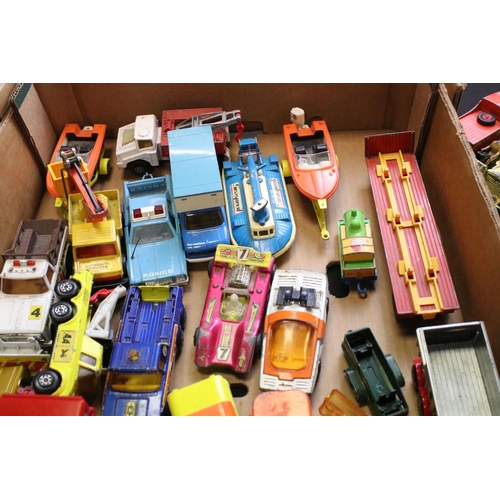 1253 - Over 35 mid 20th C onwards play worn diecast models to include Matchbox & Dinky, featuring Dinky Sup... 