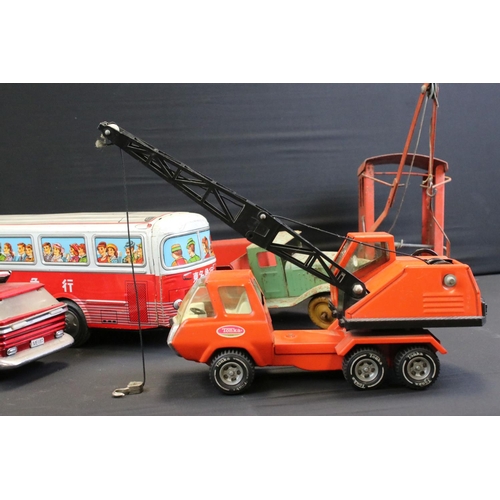 1259 - Two vintage tin plate models to include Chinese battery operated bus and Ichiko Japan coach plus 5 x... 