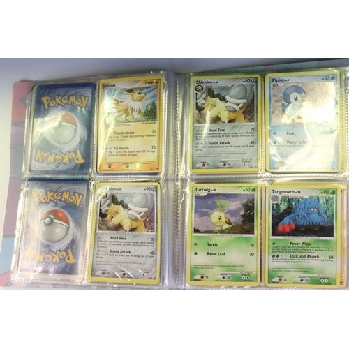 1560 - Pokémon Trading Cards - Large collection Of Pokemon Cards to include common, uncommon, rare, holo ra... 