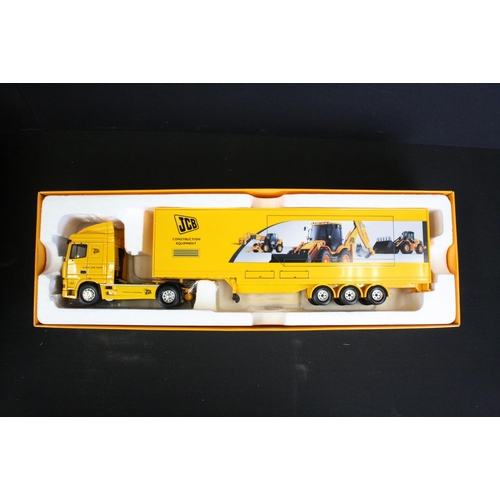 1069 - Four Boxed Corgi JCB 1:50 scale ltd edn diecast models to include CC13425 Man TGA Nooteboom Low Load... 