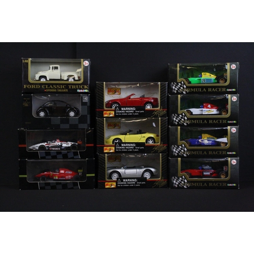 1129 - 36 Boxed diecast models to include 22 x Burago 1/43 Street Fire models, 5 x Teamsters, 3 x Maisto sp... 