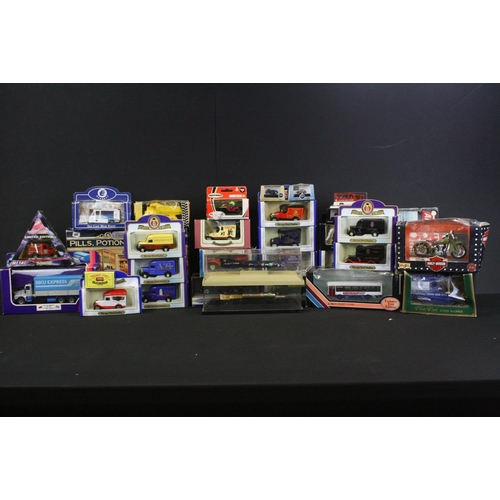 1146 - Over 60 Boxed / cased diecast models to include Oxford Diecast, Matchbox, Siku, Tonka and ERTL examp... 