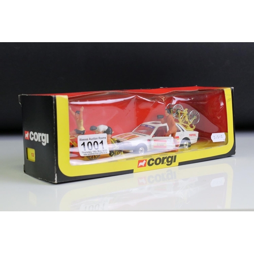 1001 - Two boxed Corgi 13 Tour de France diecast model and figure sets, both complete, model sex and appear... 