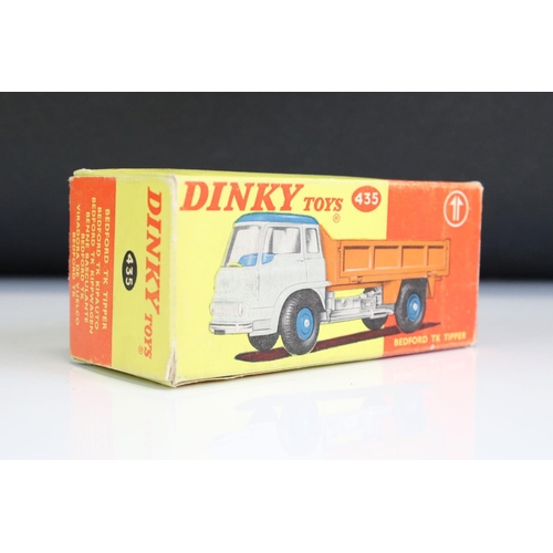 1352 - Three boxed Dinky 435 Bedford TK Tipper diecast models to include white cab / orange tipper, all yel... 