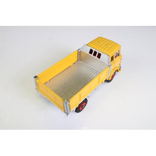 1352 - Three boxed Dinky 435 Bedford TK Tipper diecast models to include white cab / orange tipper, all yel... 